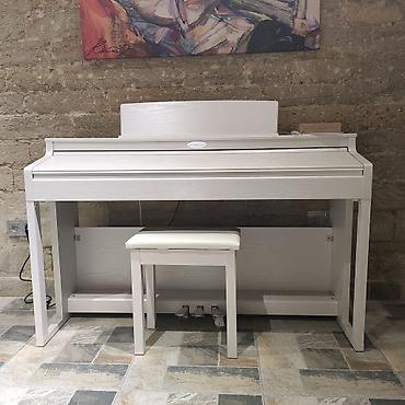 Musiqi alətləri: Elektro piano Conrad graf TA 800 Polifoniya:128 Klavişlər:88 — 2