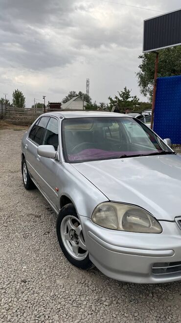 каракол машина ауди 80 бочка каракол: Серебристый седан Honda Civic с четырехдверным кузовом, выполненный в