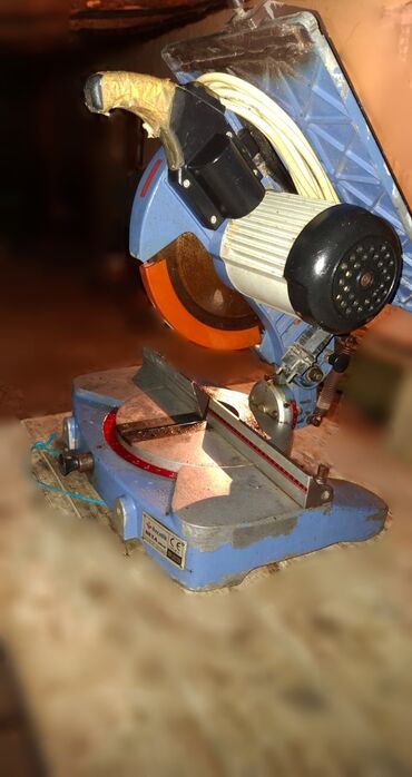 Uqlorezlər: Özçelik marka künc kəsən (mitre) diskli dəzgah - Material: ağac, MDF — 4