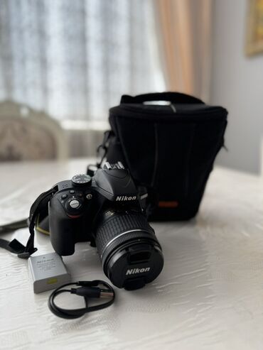 никон d3000 цена: Фотоаппарат Nikon D3300 с объективом. В комплект входит аккумулятор