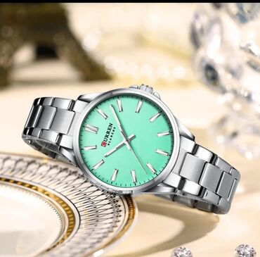 Qol saatları: Qadın saatı 
Curren — 2