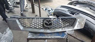 Решетки радиатора: Решетка радиатора Mazda Оригинал — 3