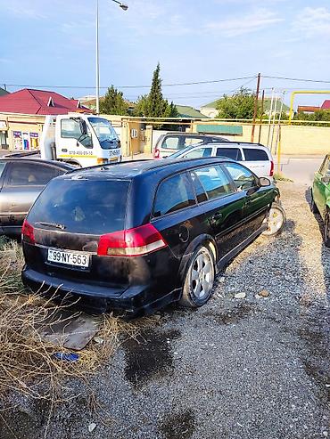 бампер опель вектра б: Opel Vectra C Caravan (universal), qara rəng Xüsusiyyətlər: - Kuzov — 4