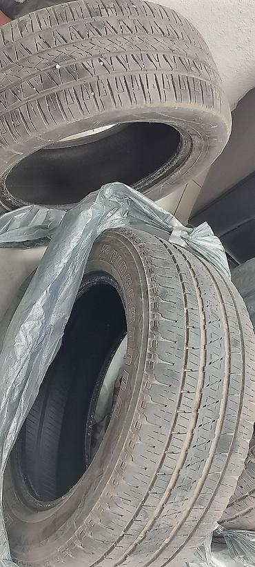 d 110: Комплект из 4 летних шин Bridgestone Dueler H/L - Размер: 255/55 R18 — 3