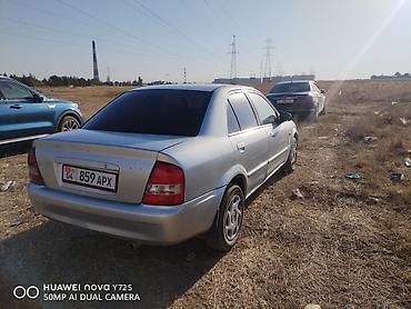 forester 2004: Mazda Familia: 2000 г., Бензин, Седан — 3