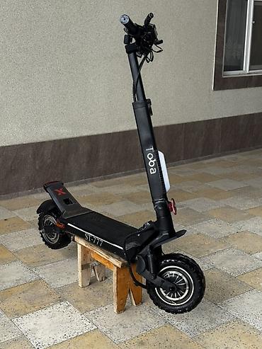 qara canta: Güclü elektrikli skuter – ST-777 Xüsusiyyətlər: - Güclü ikili motor — 1