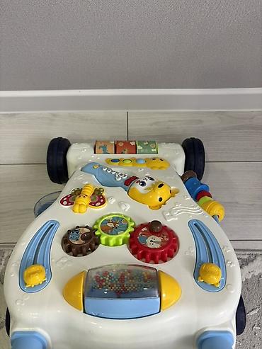 Детские ходунки: Развивающая каталка-ходунки для малышей - Устойчивая конструкция на 4 — 9