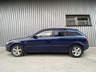 mazda 7: Mazda 323: 2001 г., 1.6 л, Автомат, Бензин, Хэтчбэк — 2