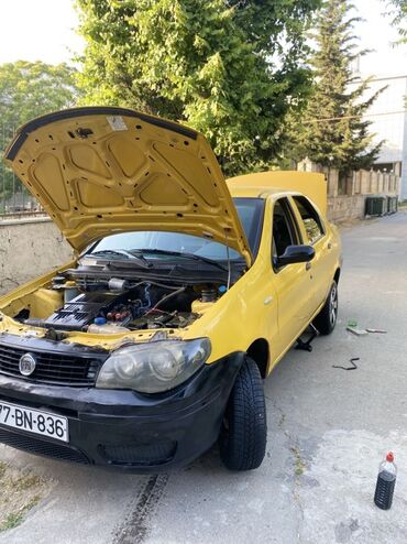 Avtomobil alışı: Fiat Albea sedan Xüsusiyyətlər: - Kuzov: 4 qapılı sedan, sarı rəng
