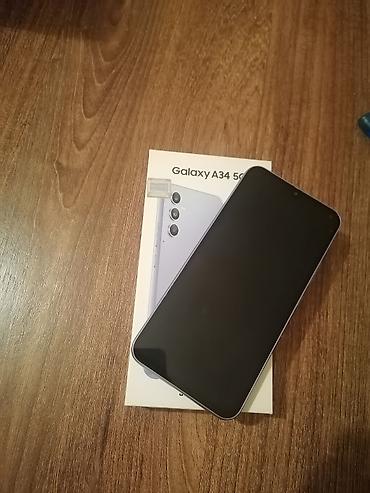 kompüter çanta: Samsung Galaxy A34 5G, 128 GB, rəng - Bənövşəyi, Qırıq — 1