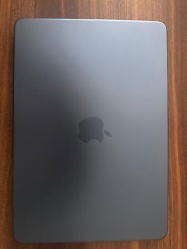 2.el macbook: Apple MacBook Air A3404 modeli təqdim olunur. Cihazın alt hissəsindəki — 5
