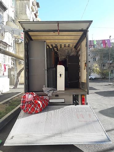 pion buket: Yük daşıma. Yuk dasinma. Yuk dasima. Bag evlerinin kocurulmesi. bina — 1