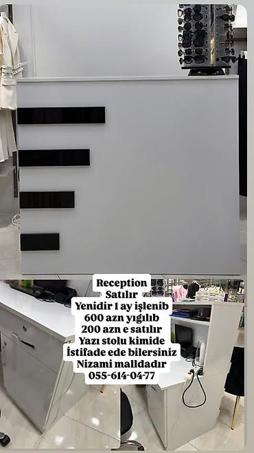 ofisde islenib: Resepsiyon/iş masası satılır - Rəng: ağ, ön paneldə qara dekorativ — 1