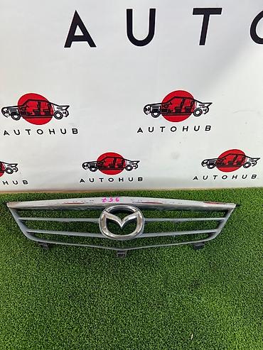 mazda 2000: Решетка радиатора Mazda Capella GW8W 1.8, 2002 г. - Оригинальная — 1