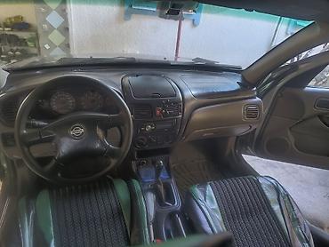 sl 55: Nissan Almera: 2000 г., Механика, Седан — 4