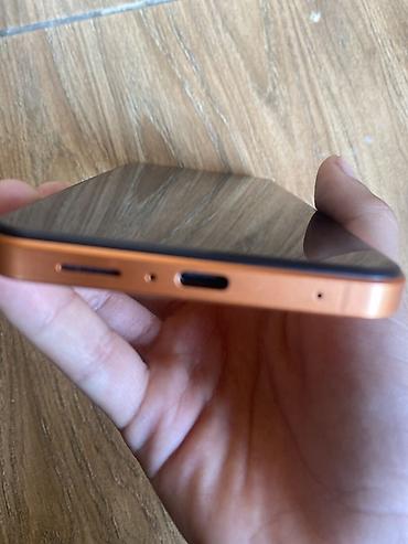 standoff 2 hesap satis: Məhsul: narıncı rəng çalarında smartfon - Ekran: Ön hissədə mərkəzlə — 2