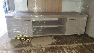 Komode: TV komoda od bele iverice 2.30m duzine. Moguca izrada i dugih — 8