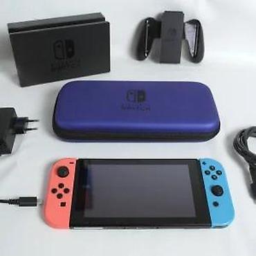 Nintendo Switch: U ponudi je Nintendo Switch. Stanje: lepo očuvana, manji tragovi — 16