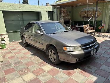Nissan: Satılır: Nissan Altima * İl: 2001 * Yürüş: 254 835 mil * Mühərrik — 2