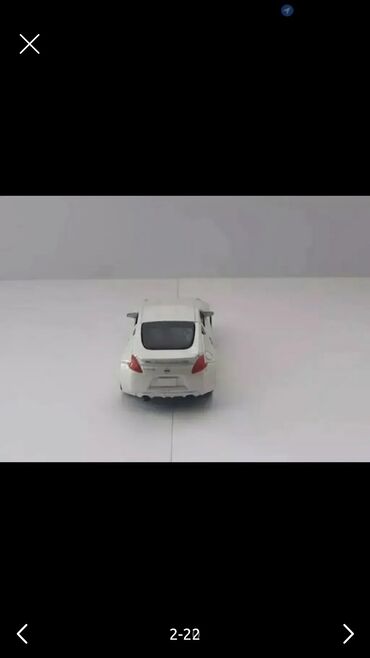 Oyuncaqlar: Təcili Satılır. Endirim Var. Nissan 370z Cupe modelka satılır.Ağ — 2