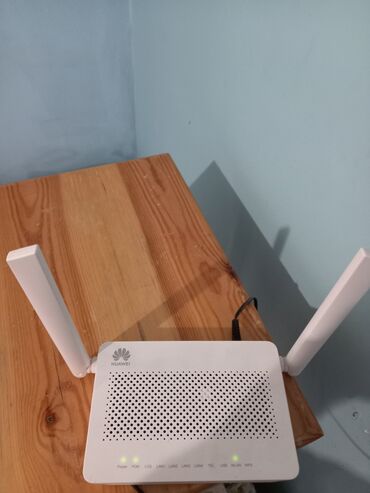komputer sicanı: Huawei EchoLife HG8145V5 GPON Terminal. Bu cihaz, ev və ya ofisdə