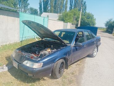 паджера мини: Продаётся автомобиль Daewoo Espero синего цвета. У машины открыт капот