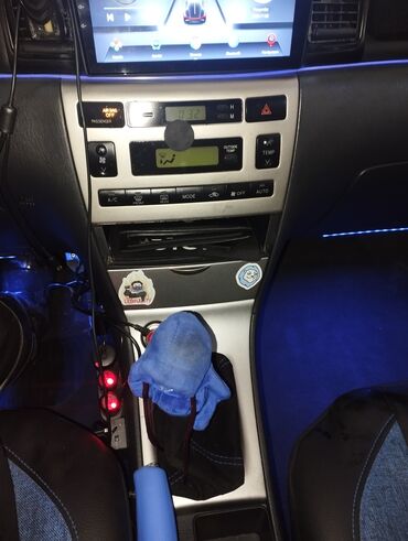 Toyota: Toyota Corolla hatchback (E12) – dizel, turbo yazılı stikerlərlə — 9