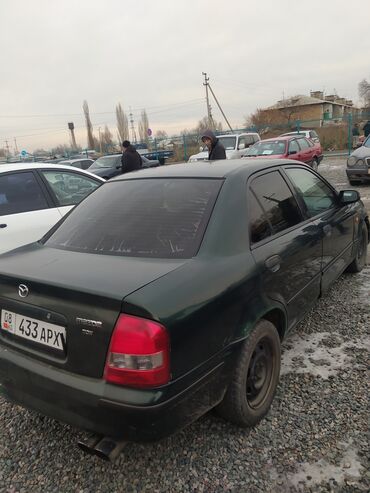 Mazda: Mazda 323: 1998 г., 1.5 л, Механика, Бензин, Седан