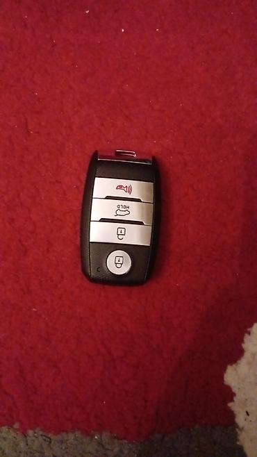 dinamometrik acar: KIA üçün orijinal smart açar. Xüsusiyyətlər: - 4 düymə: açma — 1