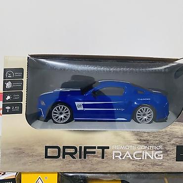 Другие игровые комплексы: Набор игрушек и электроники: 1) Радиоуправляемая модель легкового — 14