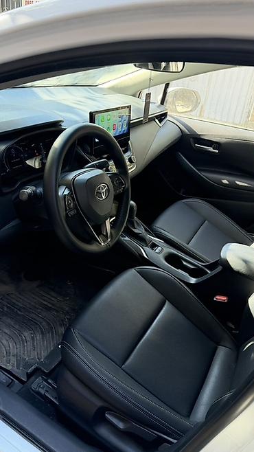 Toyota: Toyota Corolla: 2023 г., 1.8 л, Вариатор, Гибрид, Седан — 4