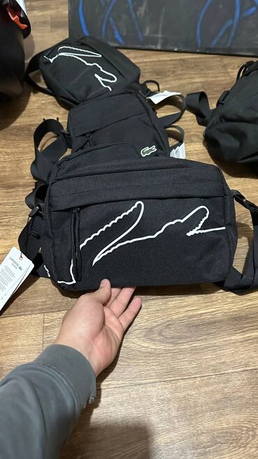 коженная барсетка: Барсетки Lacoste в lux качестве 
всё фурнитуры один в один