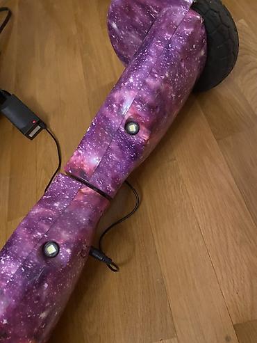 Электротранспорт: Elektrik hoverboard – qalaktika temalı bənövşəyi dizayn 1 ildir — 2