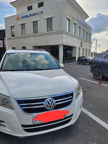 fosfagen: Volkswagen Tiguan – ağ rəngli, şəhər və uzun yol üçün funksional — 1
