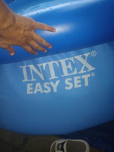 islenmis hovuzlar: Şişmə hovuz – dairəvi, mavi rəng, “Easy Set” tipli. - Ölçü: təxminən — 6