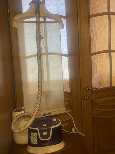 паровый утюк: Отпариватель Tefal, Вертикальный, Долив воды в процессе глажки