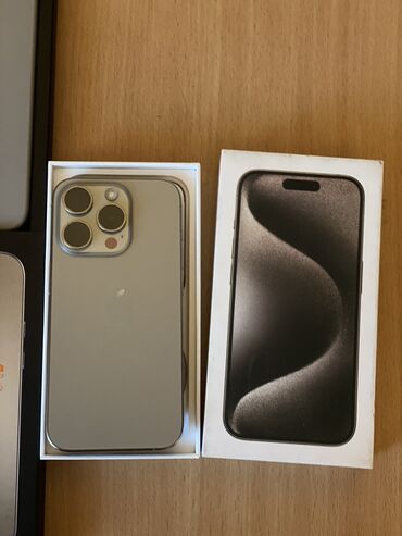 Apple iPhone: IPhone 15 Pro, 128 GB, Natural Titanium, Barmaq izi, Simsiz şarj, Face ID