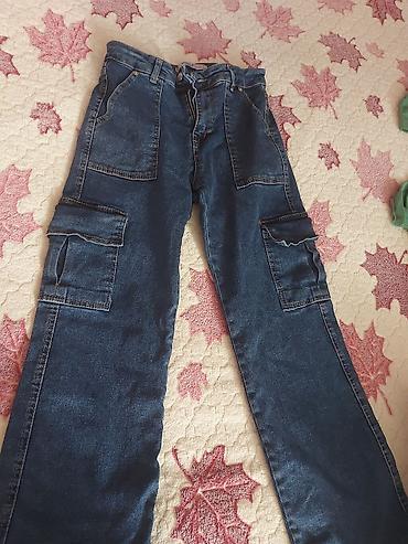 Cinslər: Kargo ciblikli cins şalvar - Material: klassik cins (denim), tünd — 1