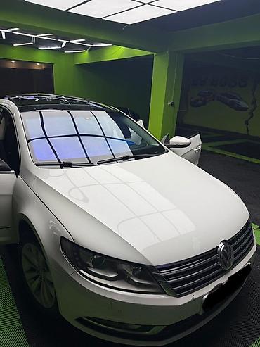 passat 2002: Volkswagen Passat CC – ağ rəngli, fastback kuzovlu 4 qapılı kupe — 1