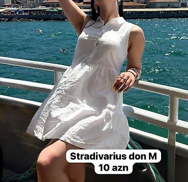 Dəstlər, kostyumlar: Qadın geyimləri – ölçü M - Ağ zolaqlı iki hissəli dəst: düyməli — 2