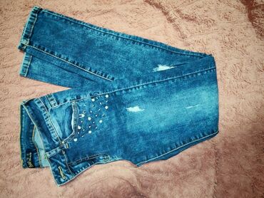 Farmerke: Ženske farmerke – nekoliko para Cena za dva para koju imaju ostecenja — 18