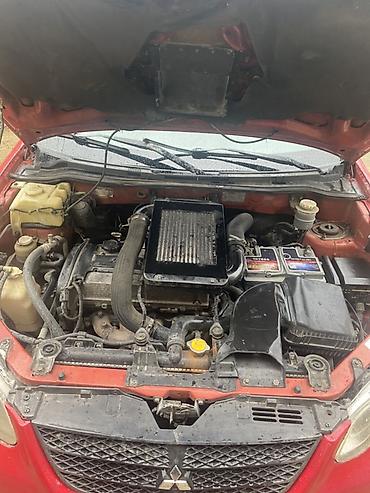 inci 75 amper aku: Mitsubishi Lancer: 2 l | 2002 il 287332 km Universal — 5
