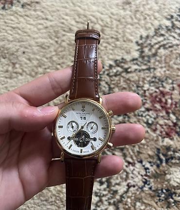 dini saat: Patek Philippe Geneve qol saatı (MEXANİKA) Təmiz mexanikadır — 2