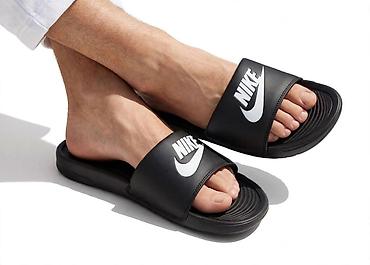 planika kucne papuce: Nike muške papuče – crne - Model: klasične klizačice sa širokom — 1