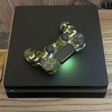 PS4 (Sony Playstation 4): Sony PlayStation 4 Slim oyun konsolu - Rəng: qara - Korpus: kompakt — 2