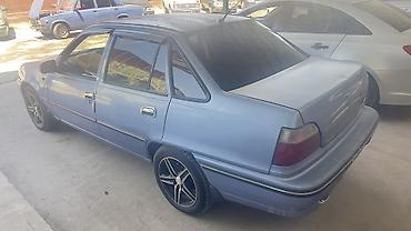 салон нива: Daewoo Nexia: 2006 г., Седан — 2