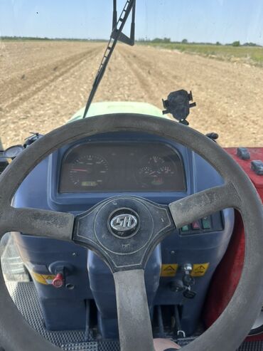 Другие тракторы: Трактор колесный с кабиной, универсальный для полевых работ. Основные — 4