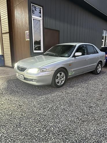 стекол: Mazda 626: 2000 г., 2 л, Автомат, Газ, Седан — 5