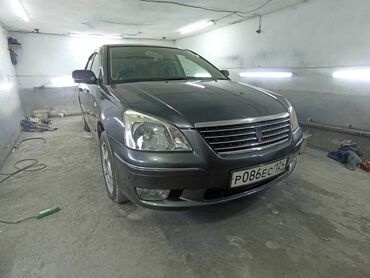 Toyota: Автомобиль Toyota Allion серого цвета. Кузов типа седан СТС эле бар