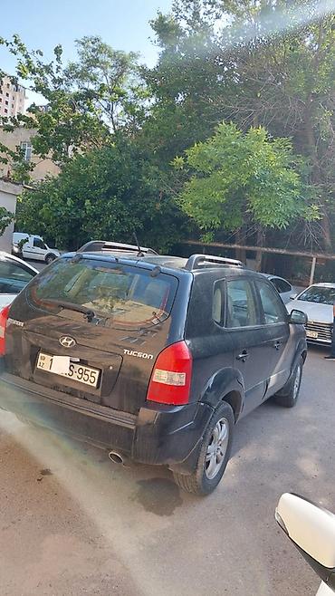 hundai tukson: Hyundai Tucson, qara rəng, 5 qapılı SUV. İli 2006-nın sonu(2007 — 9